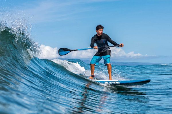 Tabla de paddle surf Quatro Glide cogiendo olas